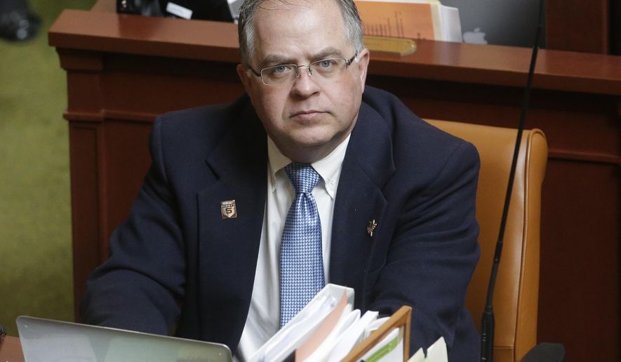 FILE - This Feb. 3, 2015, file photo, Eagle Mountain Republican Rep. David Lifferth appears on the house floor at the Utah State Capitol, in Salt Lake City. Utah lawmakers say they hope a new, unique law cuts down on the expanding and increasingly troubling forms of cyber harassment by giving authorities the ability to send the online bullies to jail. Last year, Utah legislators considered a similar bill, but stripped out the personally identifiable information portion because some committee members were concerned with how broad some terms in that section were, said than Republican Rep. Lifferth, who sponsored the 2016 bill. Lifferth's bill was never passed because lawmakers say they ran out of time. (AP Photo/Rick Bowmer, File)