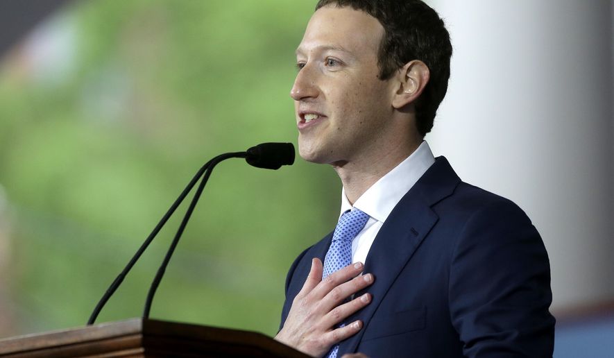 Facebook CEO and Harvard dropout Mark Zuckerberg delivers the commencement address at Harvard University commencement exercises, Thursday, May 25, 2017, in Cambridge, Mass., (AP Photo/Steven Senne)