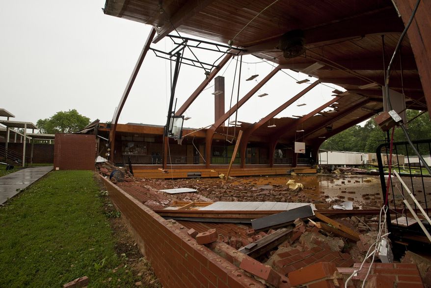 Debris rests on the floor after the roof was blown off of the gymnasium at Courtney Elementary School in Courtney, N.C. Wednesday, May 24, 2017. (Walt Unks/The Winston-Salem Journal via AP)