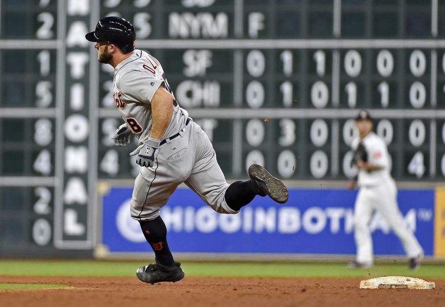 Detroit Tigers' Tyler Collins rounds second on his way to a triple during the ninth inning of a baseball game against the Houston Astros, Wednesday, May 24, 2017, in Houston. (AP Photo/Eric Christian Smith)