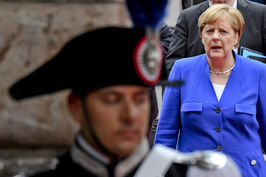 German Chancellor Angela Merkel arrives at the San Domenico Palace Hotel, the venue of the annual G7 summit, in the Sicilian town of Taormina, Italy, Friday, May 26, 2017.  Leaders of the G7 meet Friday and Saturday, including newcomers Emmanuel Macron of France and Theresa May of Britain in an effort to forge a new dynamic after a year of global political turmoil amid a rise in nationalism. (Ciro Fusco/ANSA via AP)