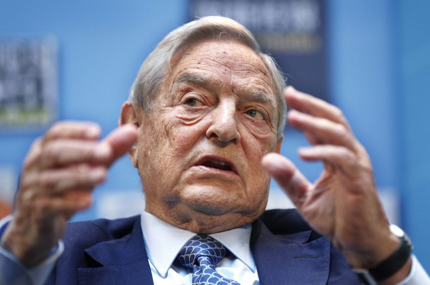 In this Sept. 24, 2011, file photo, George Soros speaks during a forum at the IMF/World Bank annual meetings in Washington. (AP Photo/Manuel Balce Ceneta, File)