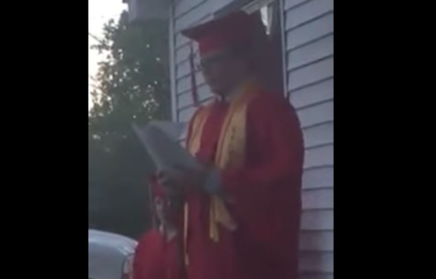 An 8th-grade salutatorian delivered a speech to a crowd of supporters across the street from his graduation ceremony in Illinois after his remarks were banned by the school for mentioning God and the Bible. (YouTube/@Todd Starnes)
