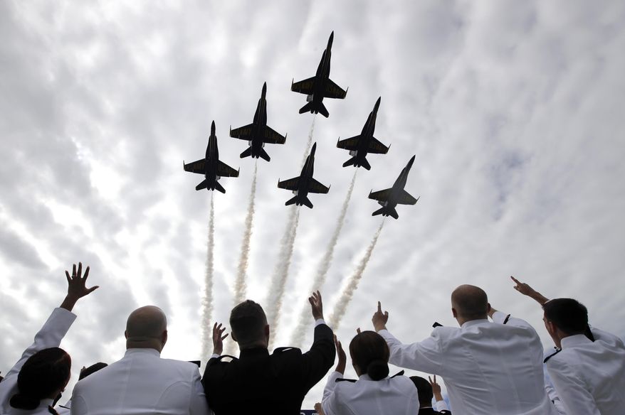 U.S. Navy Blue Angels perform a flyover above graduating U.S. Naval Academy midshipmen during the Academy&#39;s graduation and commissioning ceremony in Annapolis, Md., Friday, May 26, 2017. (AP Photo/Patrick Semansky) ** FILE **