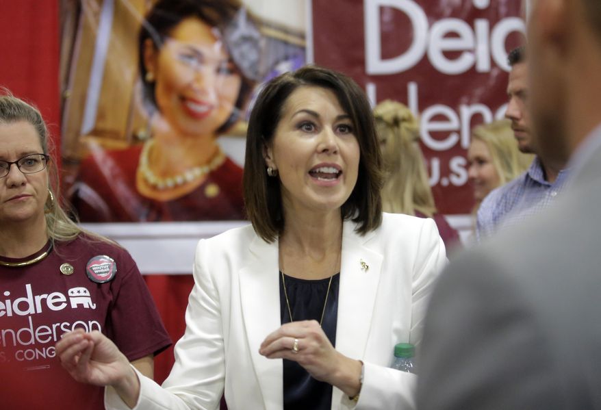 In this May 20, 2017 photo, state Sen. Deidre Henderson speaks during the Utah GOP Convention, in Sandy, Utah. Henderson and Provo Mayor John Curtis lead a packed field of candidates squaring off for the open congressional seat soon-to-be vacated by U.S. Rep. Jason Chaffetz. (AP Photo/Rick Bowmer)
