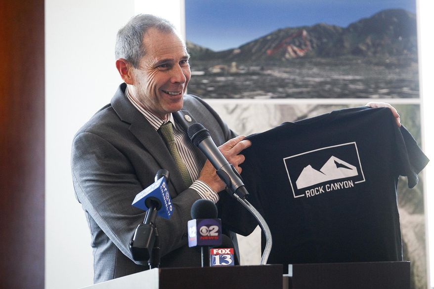 FILE - In this April 29, 2014, file photo, Provo Mayor John Curtis speaks during a news conference in Provo, Utah. State Sen. Deidre Henderson and Curtis lead a packed field of candidates squaring off for the open congressional seat soon-to-be vacated by U.S. Rep. Jason Chaffetz. A total of 10 Republicans and three Democrats had filed to run by Friday, May 26, 2017, eight days after Chaffetz announced he would resign from Congress. (Spenser Heaps/The Daily Herald via AP, File)