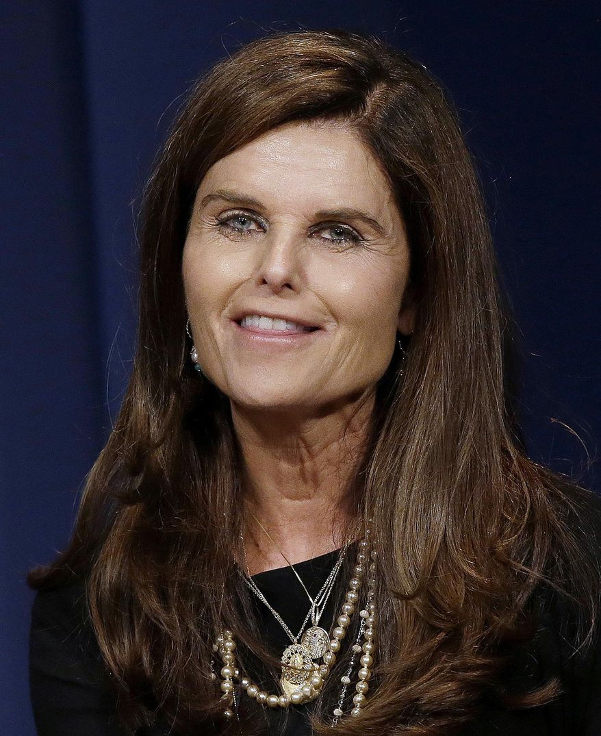FILE - In this April 20, 2017 file photo, Maria Shriver, niece of former President John F. Kennedy and former first lady of California, speaks during the John F. Kennedy Centennial Symposium at Harvard's Kennedy School of Government in Cambridge, Mass. John F. Kennedy didn't make it even halfway to 100 - a milestone he might have celebrated May 29, 2017 - but the slain U.S. president's legacy is being lived out by his descendants. (AP Photo/Stephan Savoia, File)