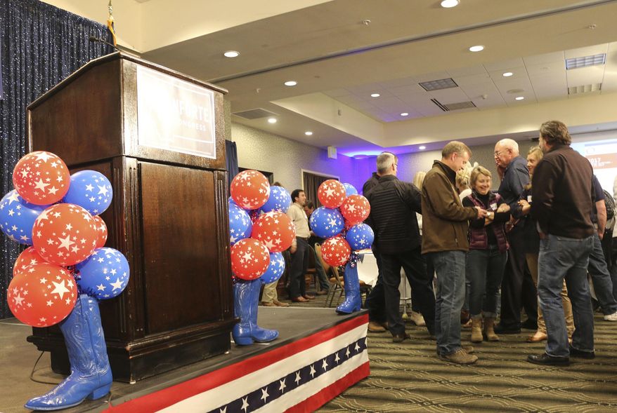The stage is prepared for the arrival of Republican congressional candidate Greg Gianforte, who was seeking to become Montana's sole member in the U.S. House, at a hotel in Bozeman, Mont., Thursday, May 25, 2017. (AP Photo/Bobby Caina Calvan)