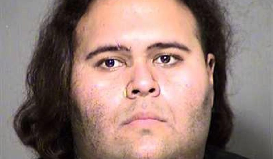 This Thursday, May 25, 2017, photo provided by the Maricopa County Sheriff's Office shows Matthew Sterling in Phoenix, Ariz. Sterling was taken into custody Thursday after a brief struggle with police at the Phoenix Convention Center. Police are adding extra security at the Phoenix Comicon following the arrest of Sterling, who was armed with guns and ammunition and who allegedly posted online threats against police officers. (Maricopa County Sheriff's Office via AP)