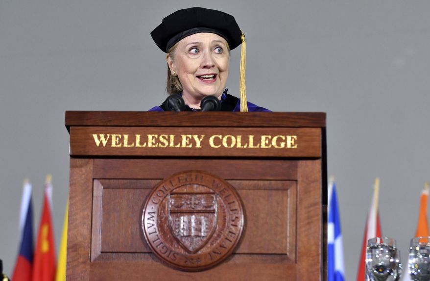 Former Secretary of State Hillary Clinton delivers the commencement address at Wellesley College, Friday, May 26, 2017, in Wellesley, Mass. Clinton graduated from the school in 1969. (AP Photo/Josh Reynolds)
