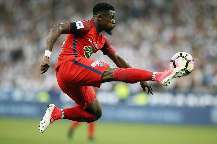 Paris Saint-Germain's Serge Aurier kicks the ball during the French Cup 2017 Final soccer match, between Paris Saint-Germain (PSG) and Angers at Stade de France in Saint Denis, north of Paris, France, Saturday, May 27, 2017. (AP Photo/Francois Mori)