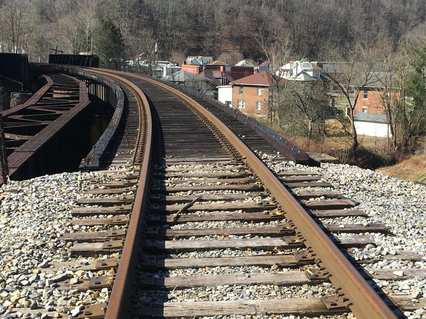 This Feb. 15, 2017 photo shows railroad tracks along the West Virginia town of Matoaka, which once carried coal trains several times a day and at night. In October 2015, Norfolk Southern discontinued regular freight service. The passenger station there closed in the 1950s. (AP Photo/Michael Virtanen)