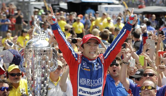 Takuma Sato, of Japan, celebrates after winning the Indianapolis 500 auto race at Indianapolis Motor Speedway, Sunday, May 28, 2017, in Indianapolis. (AP Photo/Darron Cummings)