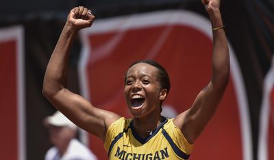 University of Michigan&#39;s Brienne Minor celebrates her victory over Florida&#39;s Belinda Woolcock in the final match of the NCAA women&#39;s tennis championship Monday, May, 29, 2017, in Athens, Ga. (AP Photo/Richard Hamm)