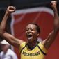 University of Michigan&#39;s Brienne Minor celebrates her victory over Florida&#39;s Belinda Woolcock in the final match of the NCAA women&#39;s tennis championship Monday, May, 29, 2017, in Athens, Ga. (AP Photo/Richard Hamm)