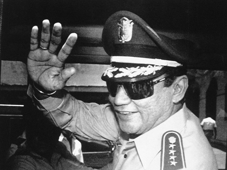 FILE - In this Aug. 31, 1989 file photo, Gen. Manuel Antonio Noriega waves to the press after a state council meeting at the presidential palace in Panama City, where the new president was announced. Panama&#x27;s ex-dictator Noriega died Monday, May 29, 2017 in a hospital in Panama City. He was 83. (AP Photo/Matias Recart, File)