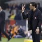 FILE - In this Sunday, May 7, 2017 file photo, AC Milan coach Vincenzo Montella gives indications during a Serie A soccer match between AC Milan and Roma, at the San Siro stadium in Milan, Italy, Sunday, May 7, 2017.  Vncenzo Montella has extended his contract as AC Milan manager by one year through the 2018-19 season. The announcement was made live on Facebook with Montella, Milan CEO Marco Fassone and sporting director Massimiliano Mirabelli. The move comes two days after Montella guided Milan to a sixth-place finish in Serie A and a spot in the Europa League playoffs in his first season in charge. (AP Photo/Luca Bruno, File)