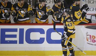 Pittsburgh Penguins&#39; Conor Sheary (43) celebrates his goal against the Nashville Predators with teammates on the bench during the first period in Game 1 of the NHL hockey Stanley Cup Final, Monday, May 29, 2017, in Pittsburgh. (AP Photo/Gene J. Puskar)