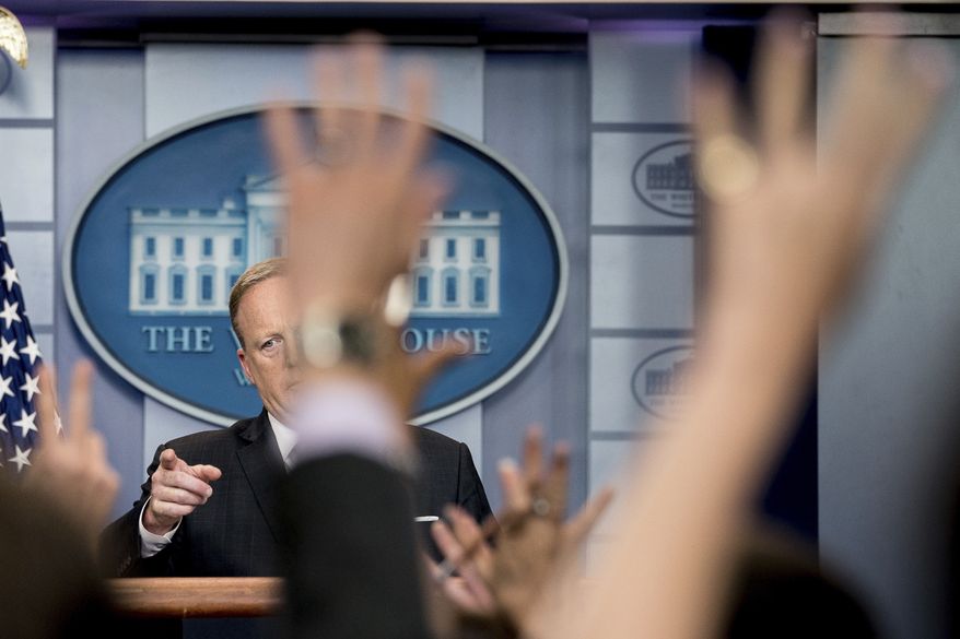 White House press secretary Sean Spicer calls on a member of the media during the daily press briefing at the White House, Tuesday, May 30, 2017, in Washington. Spicer discussed ongoing possible connections to Jared Kushner and Russians, the president's international trip, and other topics. (AP Photo/Andrew Harnik)