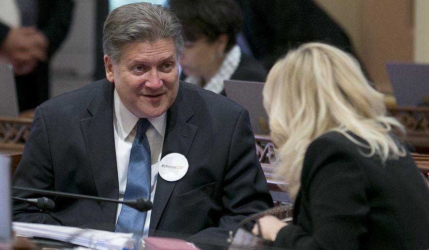 State Sen. Bob Hertzberg, D-Van Nuys, talks with Sen. Cathleen Galgiani, D-Stockton, right, after lawmakers approved his measure to change the state's bail and pretrial release policies, Wednesday, May 31, 2017, in Sacramento, Calif. By a 25-11 vote, the Senate approved Hertzberg's bill, SB10, that would end money bail for most defendants. It now goes to the Assembly. (AP Photo/Rich Pedroncelli)