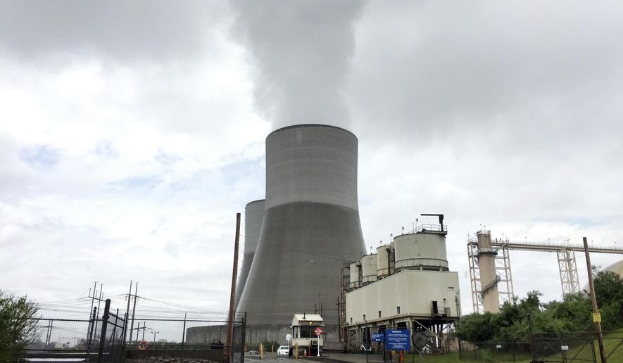 The Brayton Point Power Station, New England's largest and one of its last coal-fired power plants, appears on a cloudy day, Wednesday, May 31, 2017, in Somerset, Mass. The plant, which has been generating electricity since the 1960s along Mount Hope Bay, is shutting down permanently. It's been cited by federal regulators as one of the region's heaviest polluters. (AP Photo/Matt O'Brien