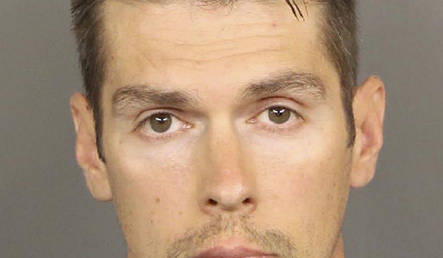 This undated photo released by the Placer County Sheriff's Office shows Deputy Robert Madden. A Northern California sheriff's deputy and two correctional officers are facing charges stemming from an investigation of excessive force on jail inmates. Placer County Sheriff Devon Ball says authorities arrested Correctional Sgt. Megan Yaws, Deputy Madden and Correctional Officer Jeffrey Villanueva on Wednesday, May 31, 2017. (Placer County Sheriff's Office via AP)