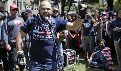 FILE--In this April 27, 2017, file photo, Joey Gibson speaks during a rally in support of free speech in Berkeley, Calif. Portland, Ore., Mayor Ted Wheeler has asked organizers of &amp;quot;Trump Free Speech Rallies&amp;quot;, set for June 4 and June 10, to cancel because of fears it could further enflame tensions in the wake of the fatal stabbing of two men in Portland last week. Rally organizer Gibson condemned the man accused of the stabbings but rejected the mayor&#x27;s call to cancel his event. (AP Photo/Marcio Jose Sanchez, file)