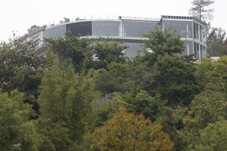 A 30,000-square-foot structure is seen unfinished in Los Angeles Wednesday, May. 31, 2017. Mohamed Hadid, a developer of luxury homes has pleaded no contest in Los Angeles to misdemeanor charges stemming from construction of this Bel Air mansion that the city says has extensive features that were never approved. City officials ordered work on the gigantic home stopped three years ago amid claims by neighbors below that the hillside above their homes had been destabilized. (AP Photo/Damian Dovarganes)