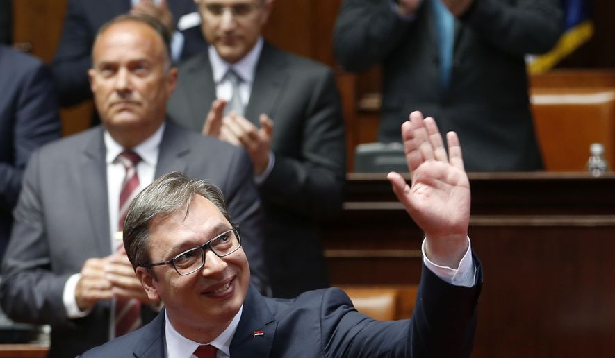Serbia&#x27;s President Aleksandar Vucic waves during an inauguration ceremony, in Belgrade, Serbia, Wednesday, May 31, 2017. Vucic has been sworn in as Serbia&#x27;s president, telling his supporters that he will work on peace and stability in the Balkans.(AP Photo/Darko Vojinovic)