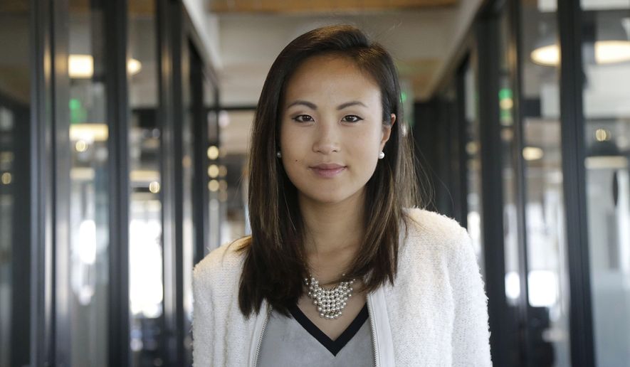 In this May 19, 2017, photo, Stephanie Shyu, co-founder of AdmitSee, poses for a picture, in San Francisco. Shyu says she and her business partner collaborated well three years earlier in forming AdmitSee, a San Francisco-based company that helps students apply for college and graduate school. As time went on, they had big differences about the company’s long-term strategy and how it should be managed. (AP Photo/Jeff Chiu)