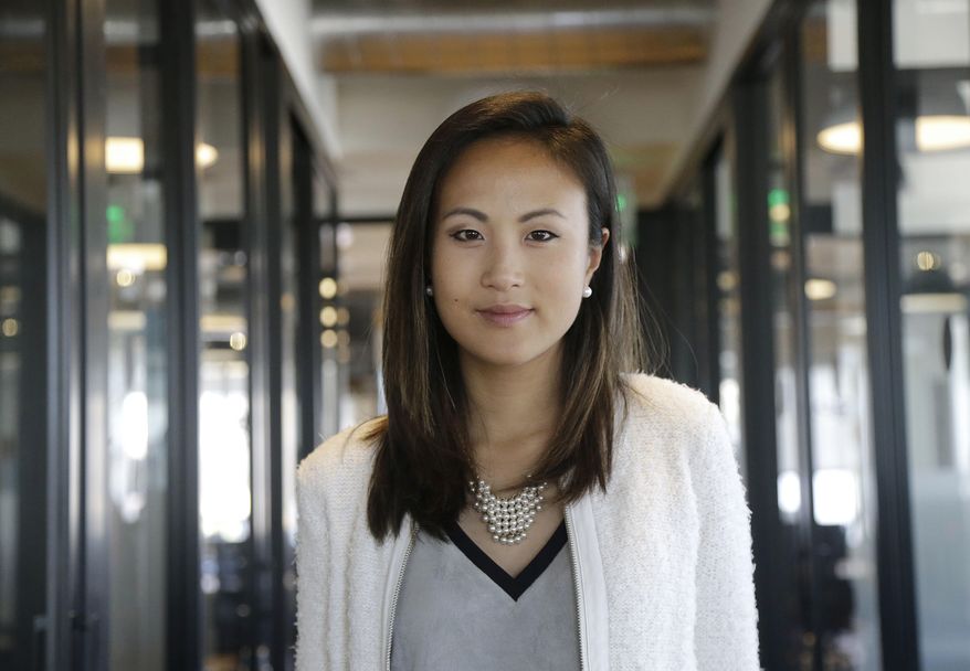 In this May 19, 2017, photo, Stephanie Shyu, co-founder of AdmitSee, poses for a picture, in San Francisco. Shyu says she and her business partner collaborated well three years earlier in forming AdmitSee, a San Francisco-based company that helps students apply for college and graduate school. As time went on, they had big differences about the company’s long-term strategy and how it should be managed. (AP Photo/Jeff Chiu)