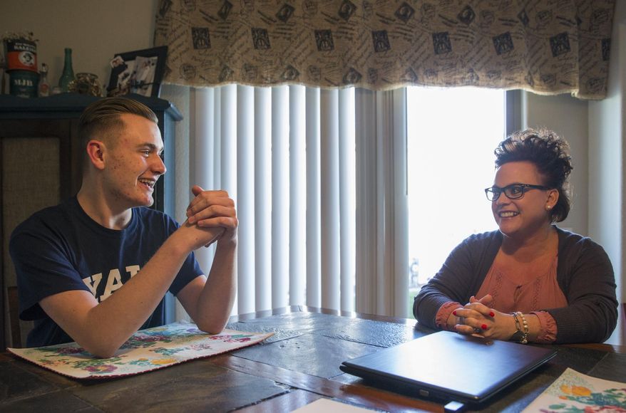 In this Thursday, May 11, 2017 photo, Ryley Constable and his mom Tracey Archer laugh with one another as they talk about Ryley&#39;s accomplishments and him getting into Yale in their home in Gillette, Wyo. (Kelly Wenzel/Gillette News Record via AP)