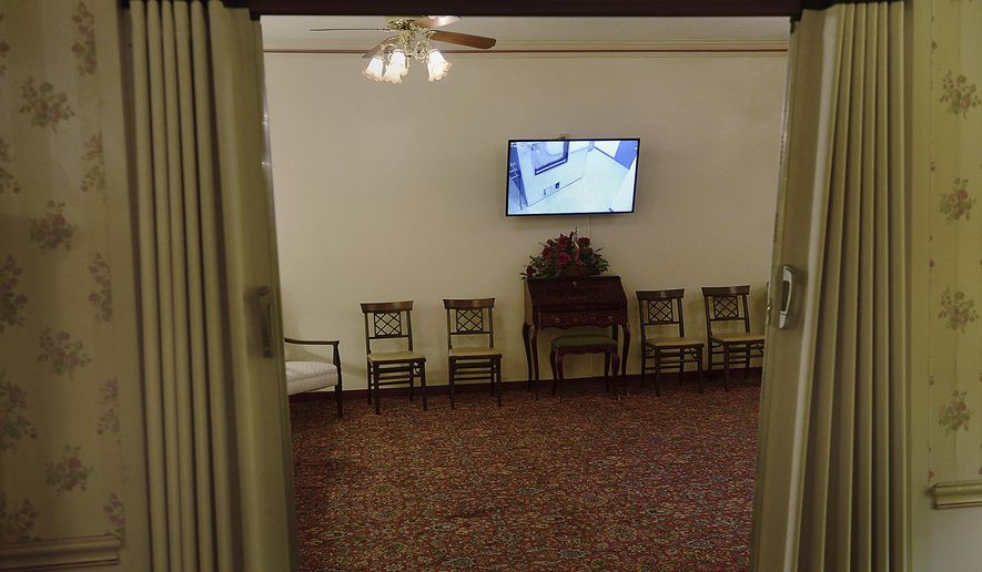 ADVANCED FOR RELEASE SATURDAY, JUNE 3, 2017 A viewing room for watching the cremation process at the Beinhauer Funeral Home Friday, May 19, 2017, in Beechview, a neighborhood in Pittsburgh. With the rise in cremations, Beinhauer Funeral Home, which has been doing cremations since the 1920's, renovated a viewing room to give family members the opportunity to be more involved in the cremation process. (Rebecca Droke/Pittsburgh Post-Gazette via AP)