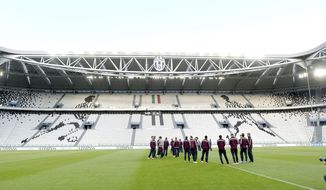 FILE - in this Monday, March 30, 2015 file photo, England team attend a training session ahead of Tuesday&#39;s international soccer match against Italy, at the Juventus Stadium, in Turin, Italy Juventus&#39; six-year-old stadium will be called Allianz Stadium until 2023. Juventus announced the awarding of the naming rights Thursday, june 1, 2017, to the German insurance company. (AP Photo/Massimo Pinca, File)