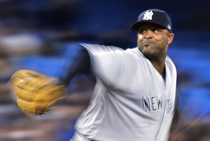 New York Yankees starting pitcher CC Sabathia winds up during the seventh inning of the team's baseball game against the Toronto Blue Jays on Thursday, June 1, 2017, in Toronto. (Frank Gunn/The Canadian Press via AP)