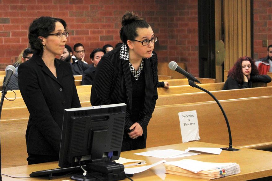 In this Tuesday, May 30, 2017 photo, University of Connecticut law professor Jessica Rubin, left, and UConn law student Taylor Hansen present arguments as animal advocates in a dog fighting case in Superior Court in Hartford, Conn. Connecticut last year became the first state to allow court-appointed advocates to represent animals in cruelty and abuse cases. (AP Photo/Pat Eaton-Robb)