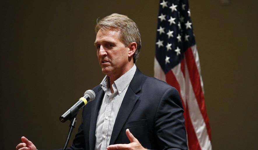 Sen. Jeff Flake, R-Ariz., speaks to members of the Glendale Chamber of Commerce Tuesday, May 30, 2017, in Glendale, Ariz. (AP Photo/Ross D. Franklin) ** FILE **