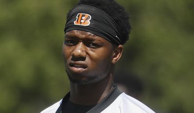 FILE - This is a May 23, 2017, file photo showing Cincinnati Bengals running back Joe Mixon during organized team activities in Cincinnati. The Bengals signed Mixon to a four-year contract Friday, June 2, 2017.(AP Photo/John Minchillo, File)