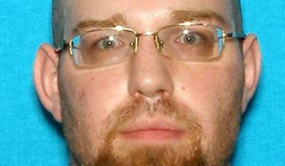 This photo provided by the Kansas Bureau of Investigation shows Dane Wright. An Amber Alert has been issued in Kansas for three children who may be with Dane Wright, a man suspected in the death of a woman whose body was found by fire crews battling a blaze at a Wichita, Kan. home, Friday, June 2, 2017. (Kansas Bureau of Investigation via AP)