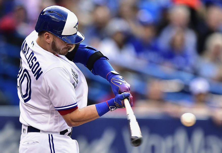 Toronto Blue Jays' Josh Donaldson hits a solo home run against the New York Yankees during the first inning of a baseball game Friday, June 2, 2017, in Toronto. (Frank Gunn/The Canadian Press via AP)