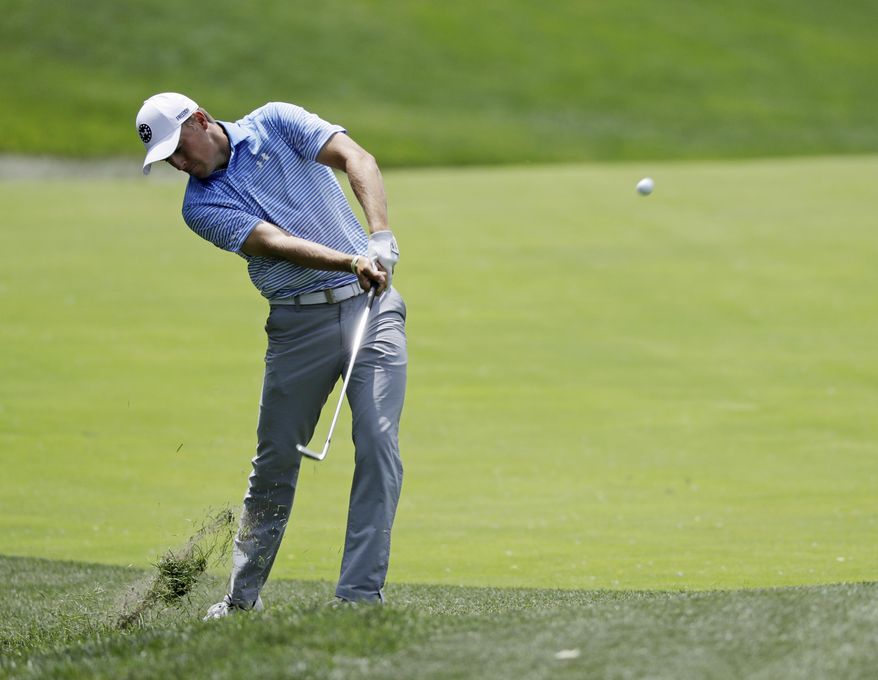 Jordan Spieth hits on the second hole during the third round of the Memorial golf tournament, Saturday, June 3, 2017, in Dublin, Ohio. (AP Photo/Darron Cummings)