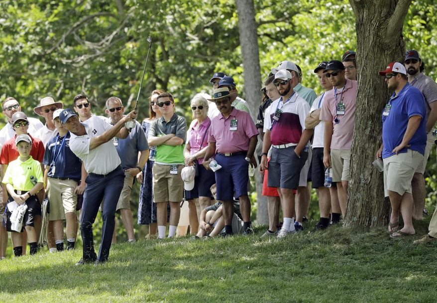 Matt Kuchar hits on the second hole during the third round of the Memorial golf tournament, Saturday, June 3, 2017, in Dublin, Ohio. (AP Photo/Darron Cummings)