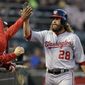 Washington Nationals&#39; Jayson Werth (28) is congratulated after scoring against the Oakland Athletics in the fourth inning of a baseball game Friday, June 2, 2017, in Oakland, Calif. Werth scored on a single by Nationals&#39; Ryan Zimmerman. (AP Photo/Ben Margot)