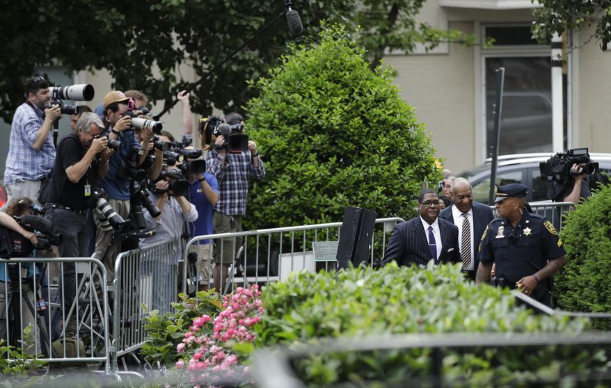Bill Cosby, second from right, arrives for his sexual assault trial at the Montgomery County Courthouse in Norristown, Pa., Monday, June 5, 2017. (AP Photo/Matt Rourke)