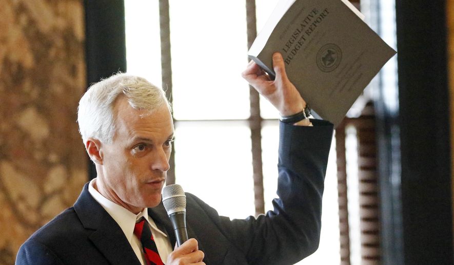 Sen. David Blount, D-Jackson, asks how the new proposed appropriations bills take care of budget needs outlined in the Legislative Budget Report, Monday, June 5, 2017, at the Capitol in Jackson, Miss. The Legislature is in the midst of a special session called by the governor that will focus on state appropriations and practices to maintain a balanced budget and healthy finances. (AP Photo/Rogelio V. Solis)