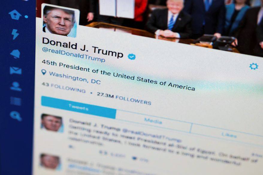 President Trump's tweeter feed is his way of circumventing the mainstream media and speaking directly to the American people, his staunch supporters argue. (Associated Press)