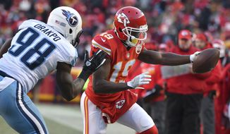 In this Dec. 18, 2016, file photo, Kansas City Chiefs wide receiver Jeremy Maclin (19) reaches for a first down next to Tennessee Titans linebacker Brian Orakpo (98) during an NFL football game in Kansas City, Mo. The Chiefs released Maclin in a stunning move Friday, June 2, midway through their voluntary workouts, bringing an abrupt ending to the tenure of what was arguably general manager John Dorsey and coach Andy Reid’s biggest free-agent acquisition. (AP Photo/Ed Zurga, File)

