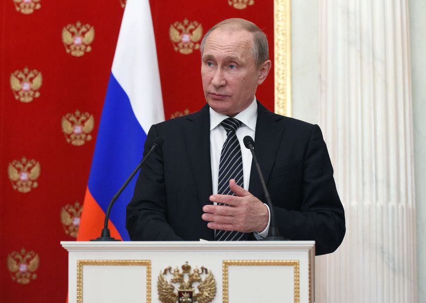 Russian President Vladimir Putin speaks at a joint news conference with Armenian President Serzh Sargsyan after their meeting in the Kremlin in Moscow, Russia, Wednesday, Aug. 10, 2016. (Vasily Maximov/Pool Photo via AP)