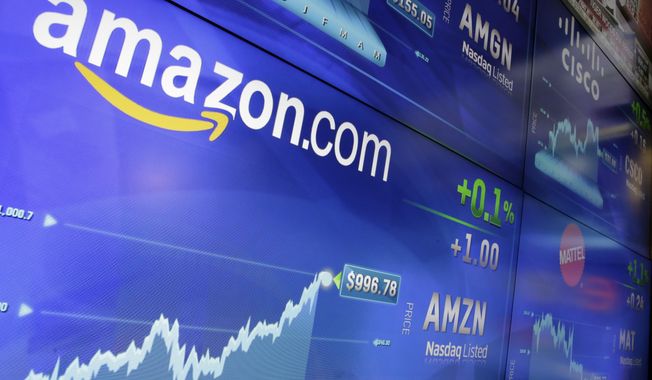 FILE - In this Tuesday, May 30, 2017, file photo, the Amazon logo is displayed at the Nasdaq MarketSite, in New York&#x27;s Times Square. Amazon is offering a discounted rate on its Prime membership for people who receive government assistance. The discounted rate is $5.99 per month. The regular annual membership is $99 per year, or $8.25 a month. But those who cannot afford to pay up front have to pay $10.99 a month for the same benefits. (AP Photo/Richard Drew, File)