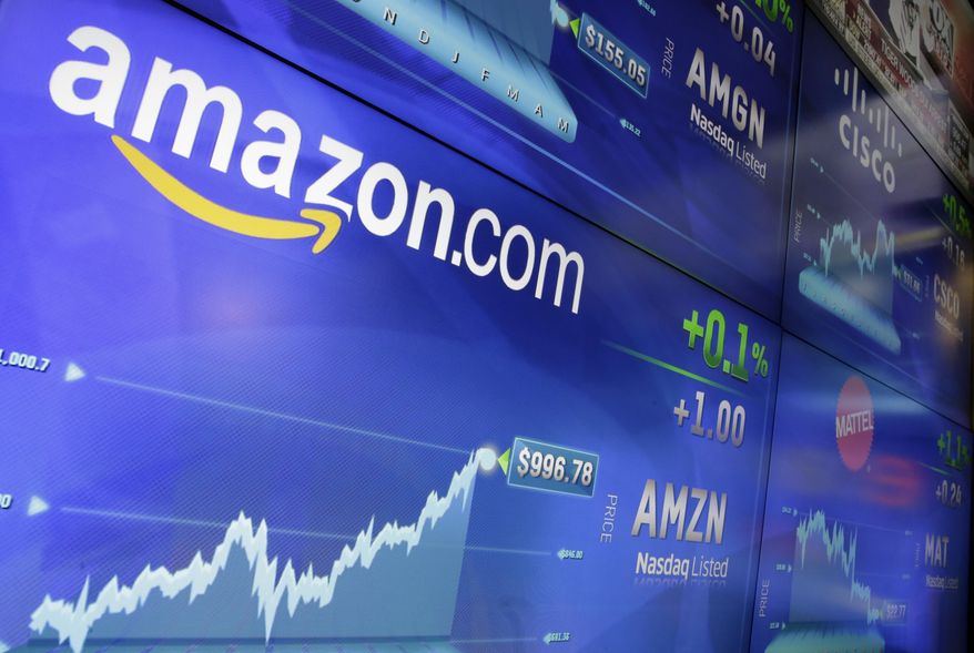 FILE - In this Tuesday, May 30, 2017, file photo, the Amazon logo is displayed at the Nasdaq MarketSite, in New York&#x27;s Times Square. Amazon is offering a discounted rate on its Prime membership for people who receive government assistance. The discounted rate is $5.99 per month. The regular annual membership is $99 per year, or $8.25 a month. But those who cannot afford to pay up front have to pay $10.99 a month for the same benefits. (AP Photo/Richard Drew, File)